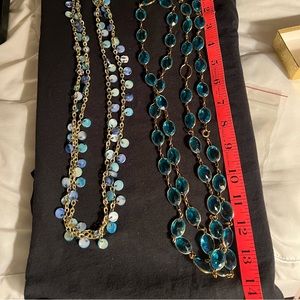 2 necklaces and earring trio